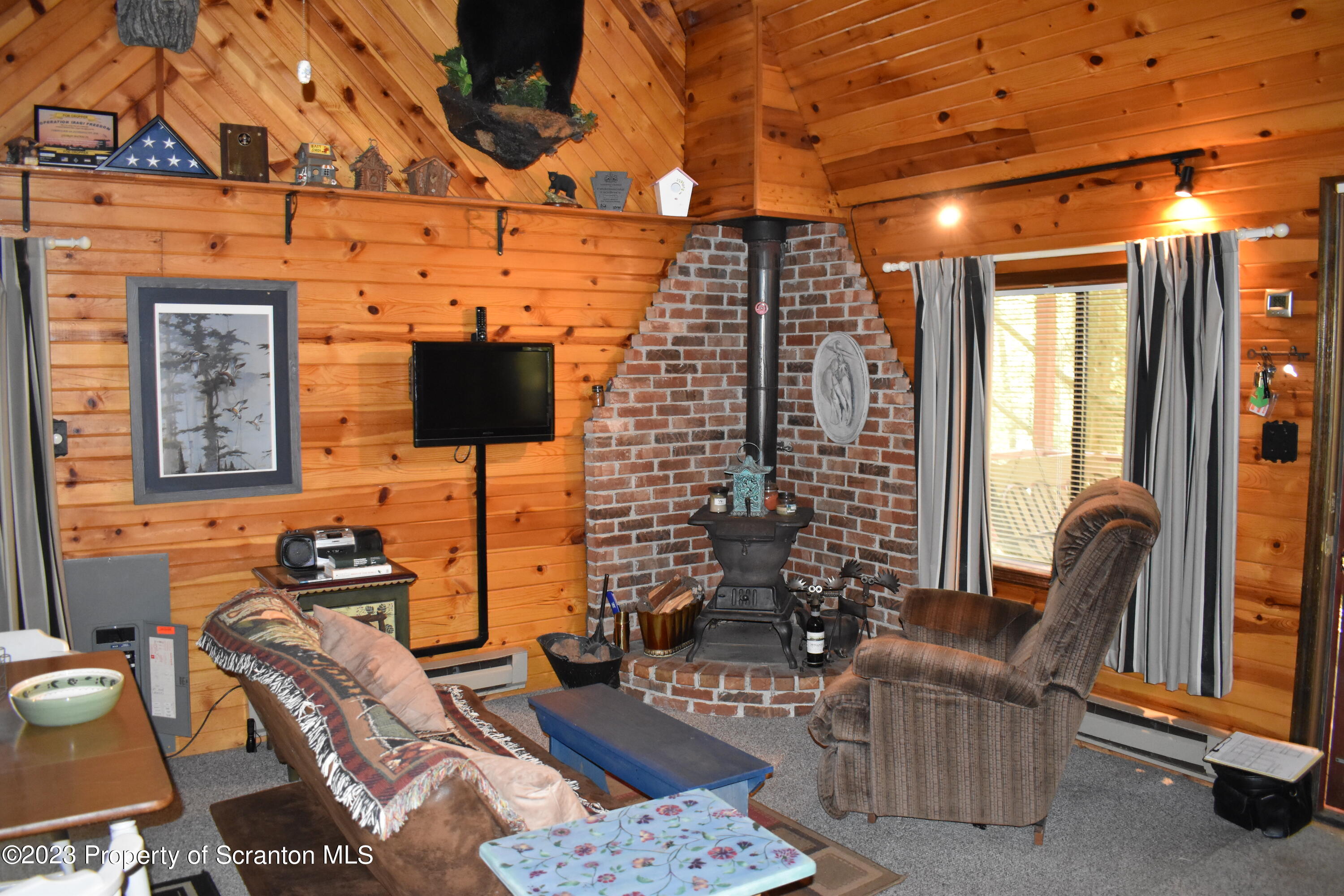 547 Camp Road New Milford, PA 18834 - Photo 6 of 27 a work room with furniture