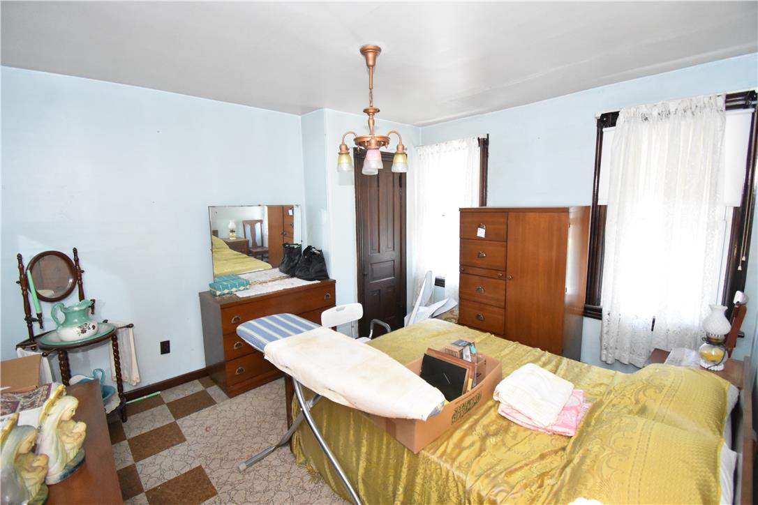1440 Butler Street Easton, PA 18042 - Photo 10 of 23 A classic chandelier illuminates this comfortable bedroom space.