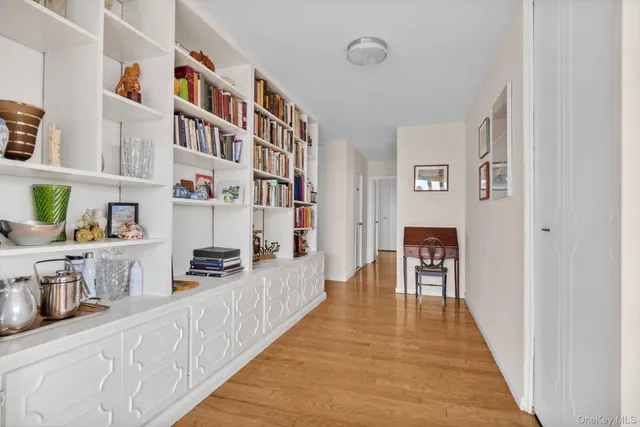 a hallway with cabinets