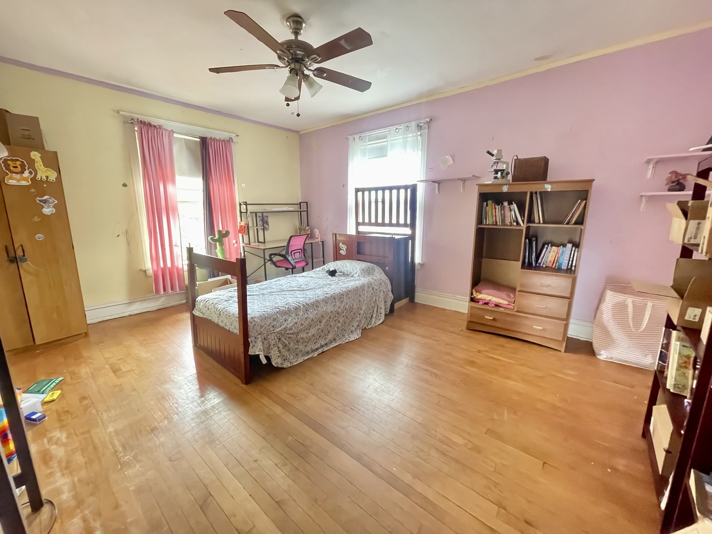 7916 South Constance Avenue Chicago, IL 60617 - Photo 20 of 28 a living room with furniture and a flat screen tv