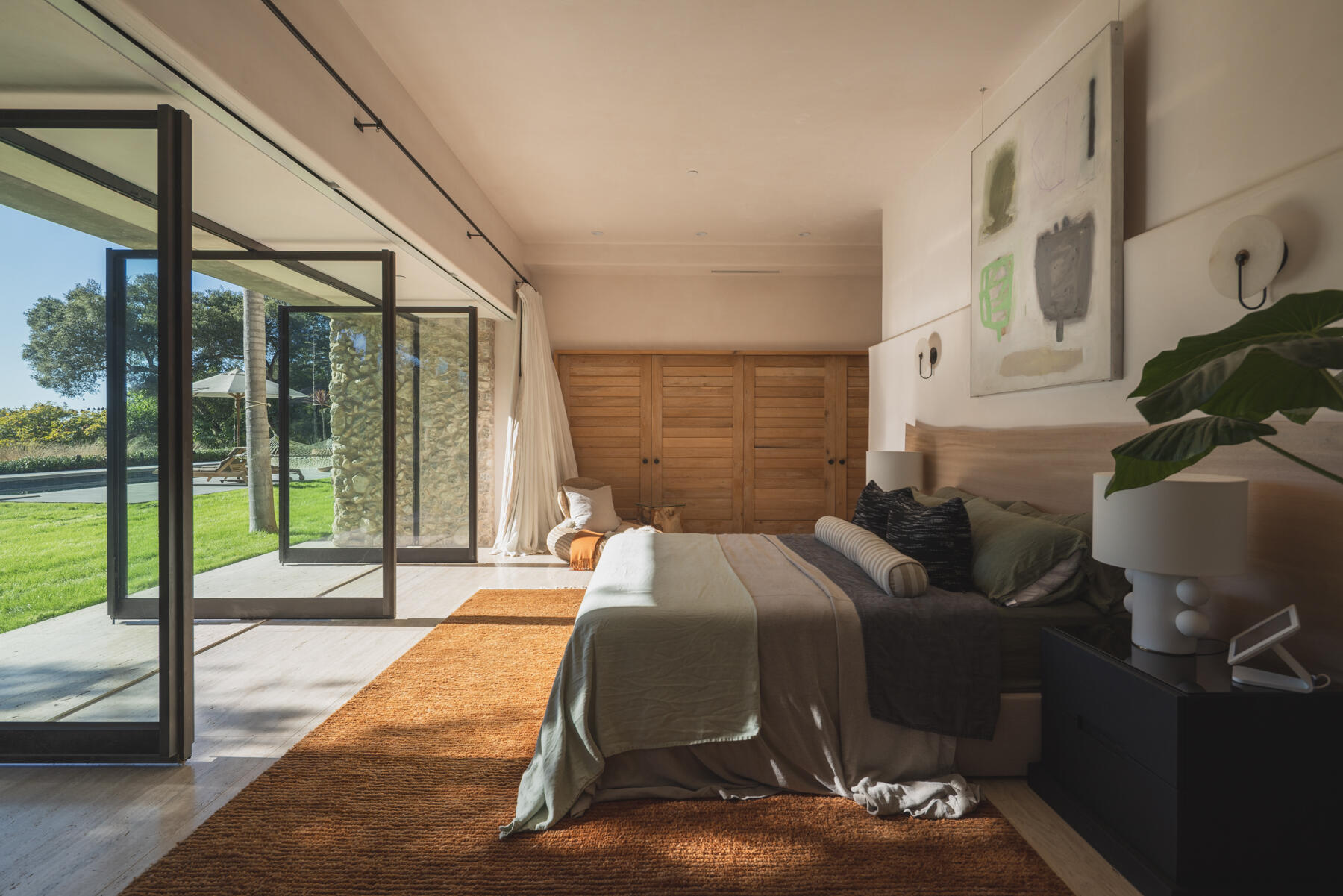 4160 La Ladera Road Santa Barbara, CA 93110 - Photo 29 of 63 a bedroom with a bed and large window with balcony view