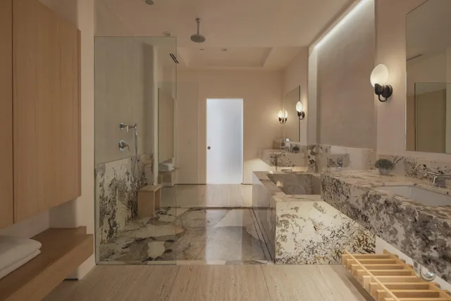 a view of swimming pool with a garden and trees