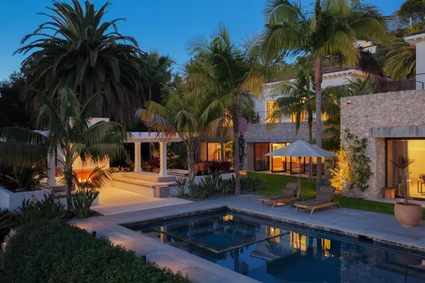 a view of a house with a swimming pool