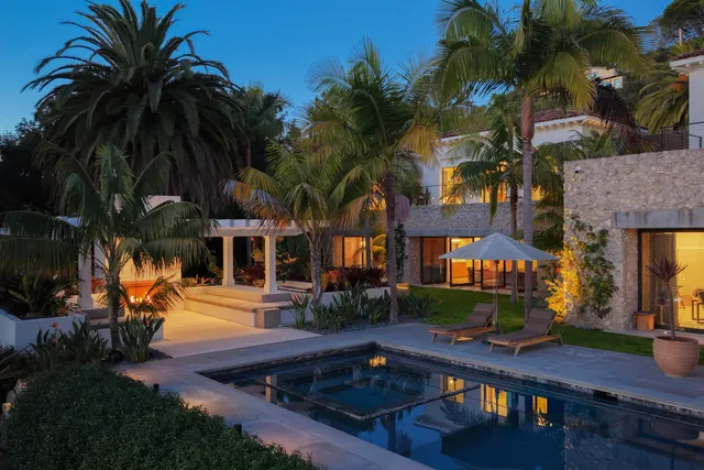 a view of a house with a swimming pool