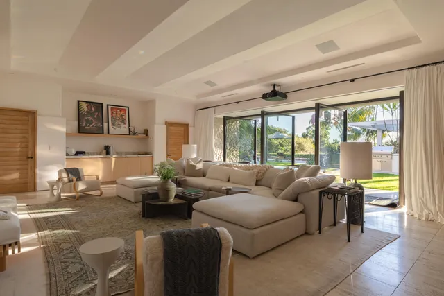 a room with sink dryer and washer