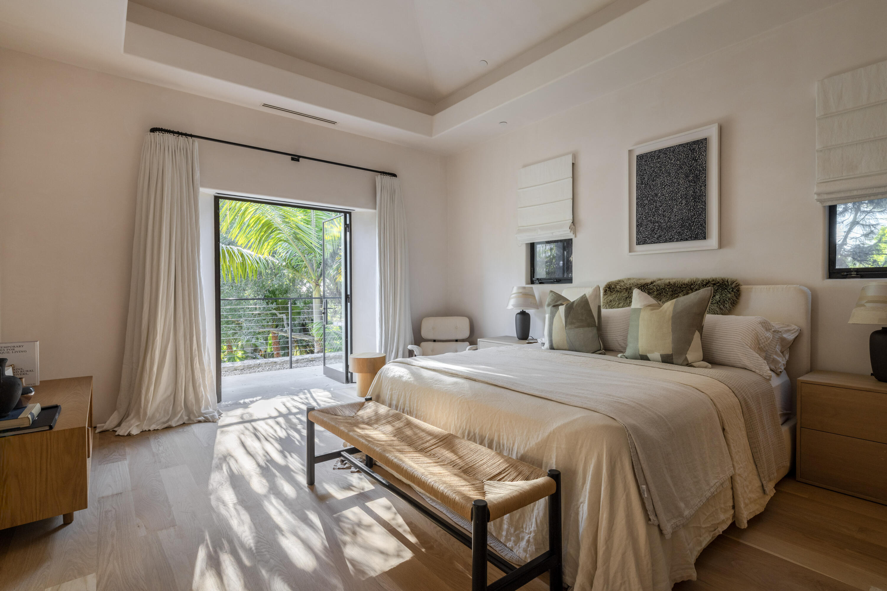 4160 La Ladera Road Santa Barbara, CA 93110 - Photo 37 of 63 a spacious bedroom with a bed and a couch