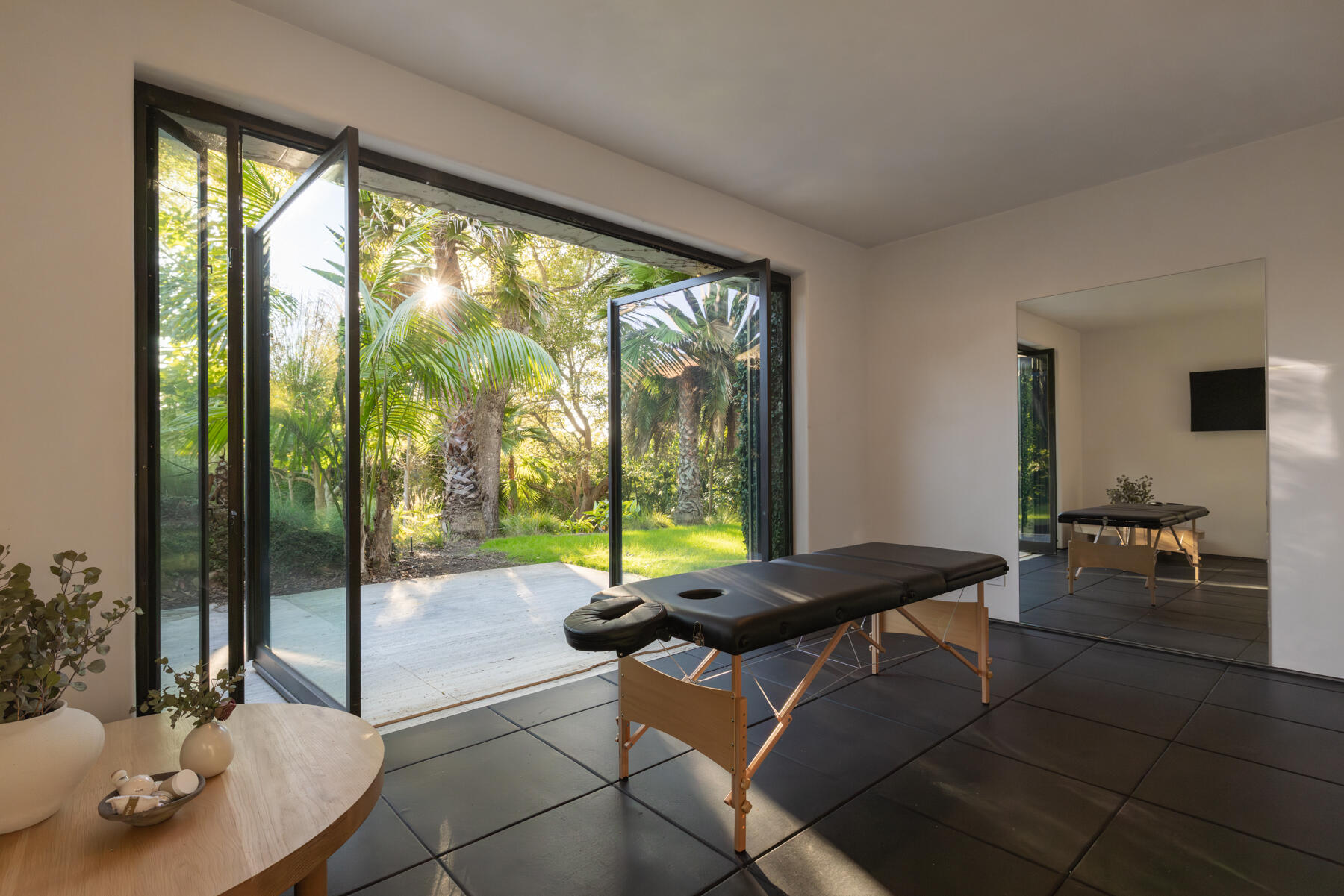 4160 La Ladera Road Santa Barbara, CA 93110 - Photo 45 of 63 a living room with furniture and a floor to ceiling window