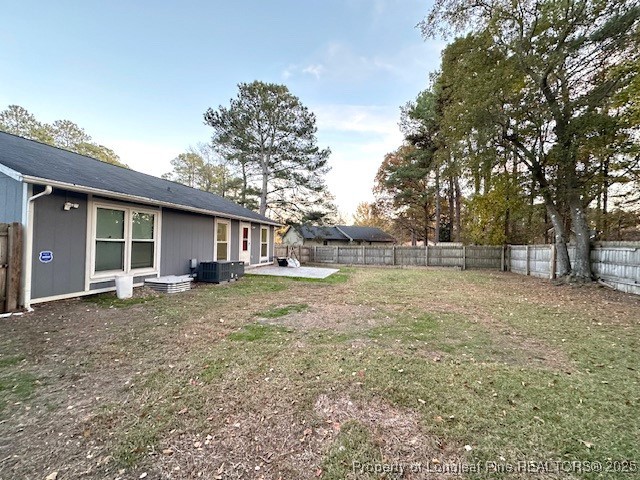 3305 Hunting Bay Drive Spring Lake, NC 28390 - Photo 3 of 15 a view of a house with backyard and trees