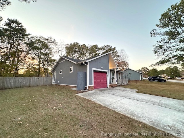 3305 Hunting Bay Drive Spring Lake, NC 28390 - Photo 5 of 15 a view of large house with a yard and large tree