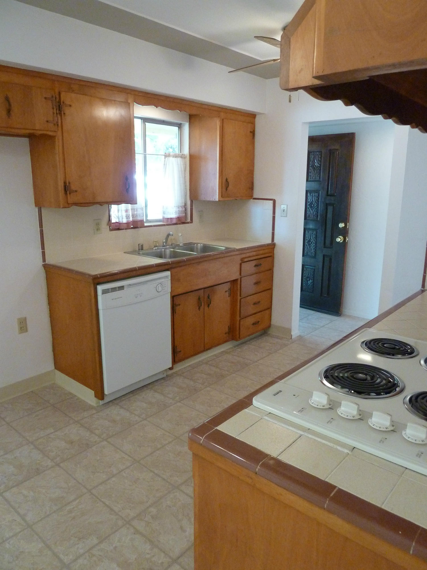 2755 Irwin Road Redding, CA 96002 - Photo 11 of 35 a kitchen with stainless steel appliances granite countertop a sink and a stove