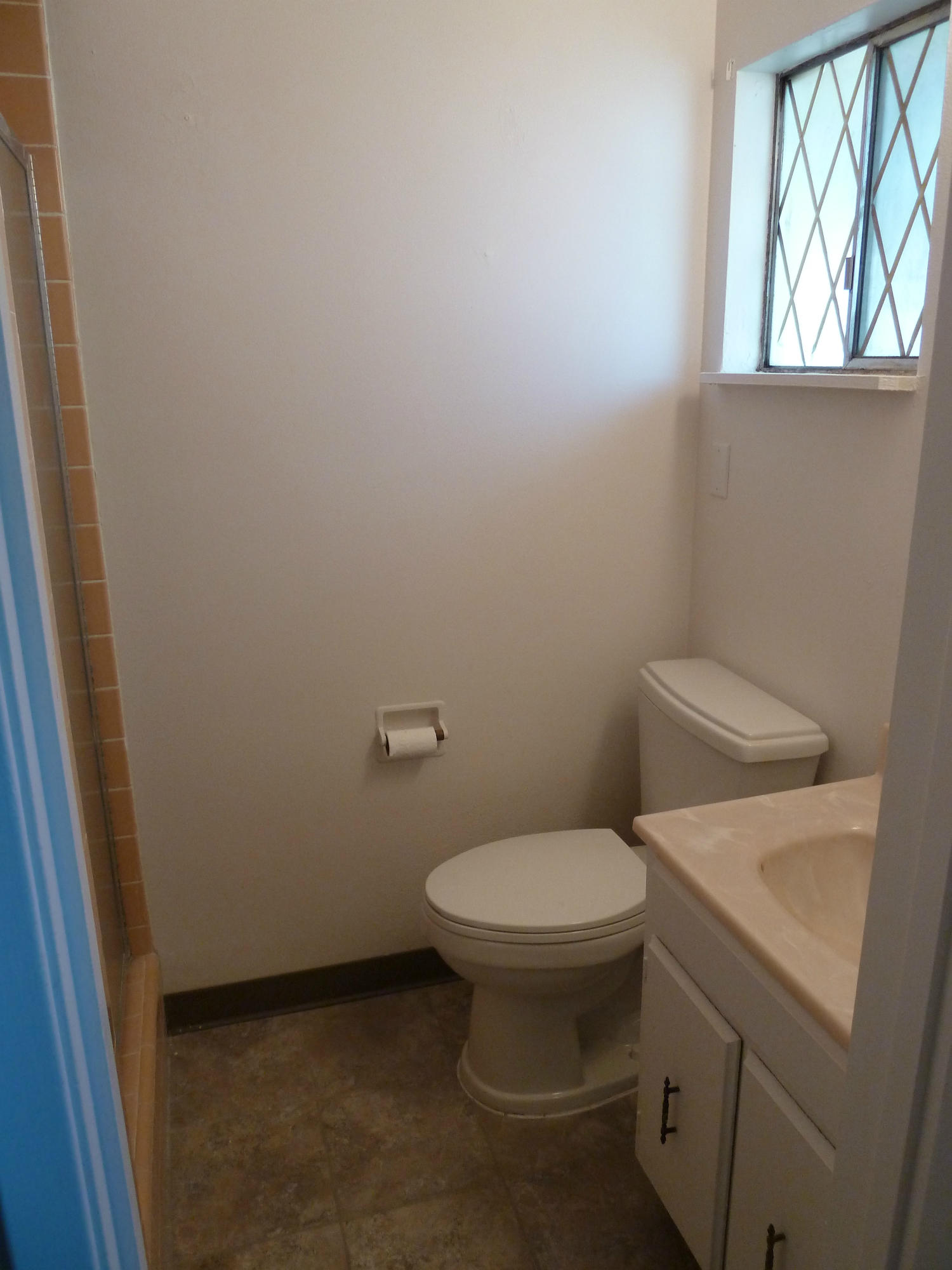 2755 Irwin Road Redding, CA 96002 - Photo 19 of 35 a white toilet sitting in a bathroom next to a window