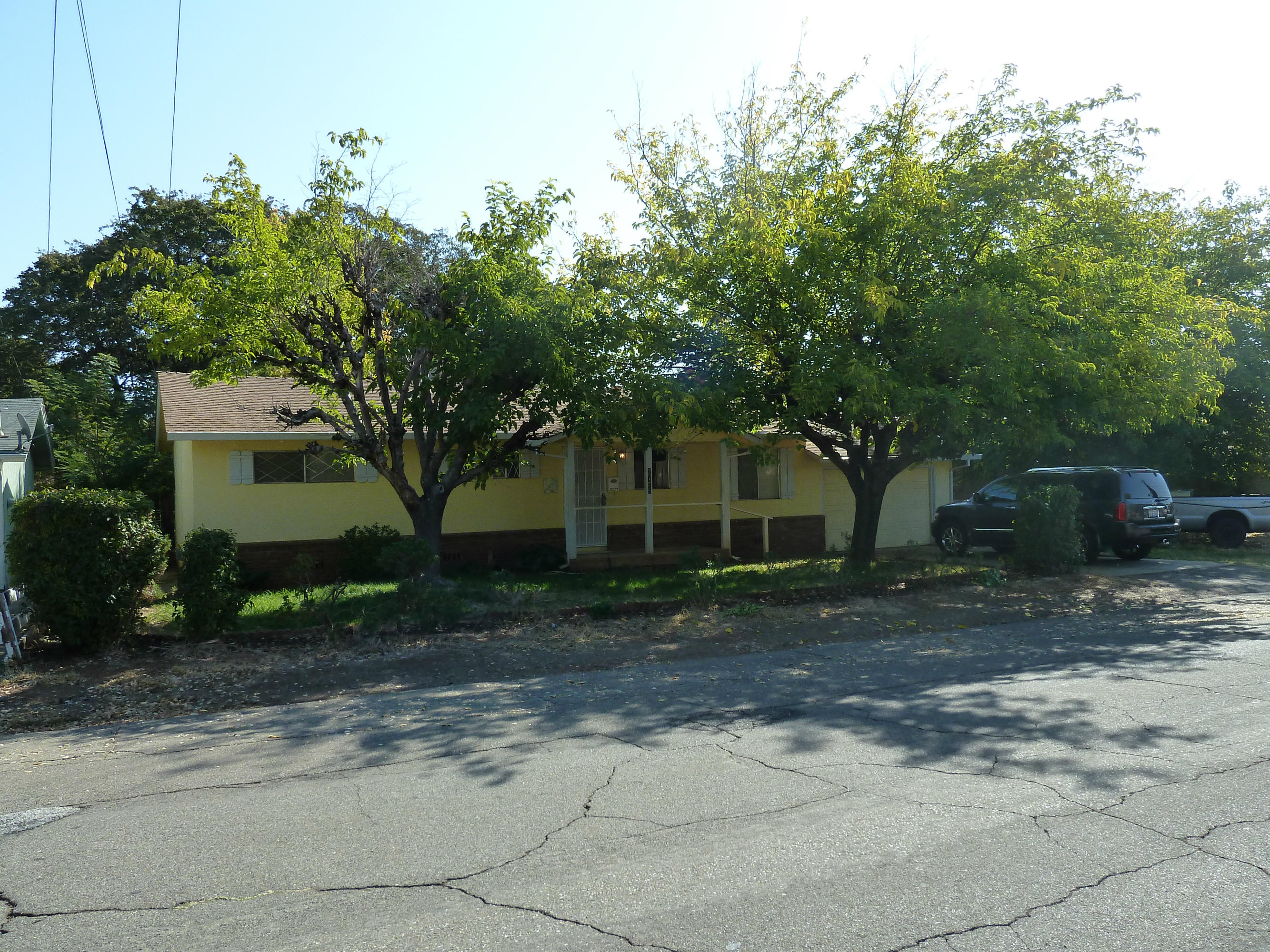 2755 Irwin Road Redding, CA 96002 - Photo 32 of 35 a view of a house with a tree in the background