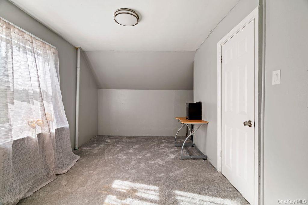 21 Jasper Street Valley Stream, NY 11580 - Photo 15 of 27 a view of empty room with windows