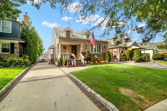a view of a building with a yard