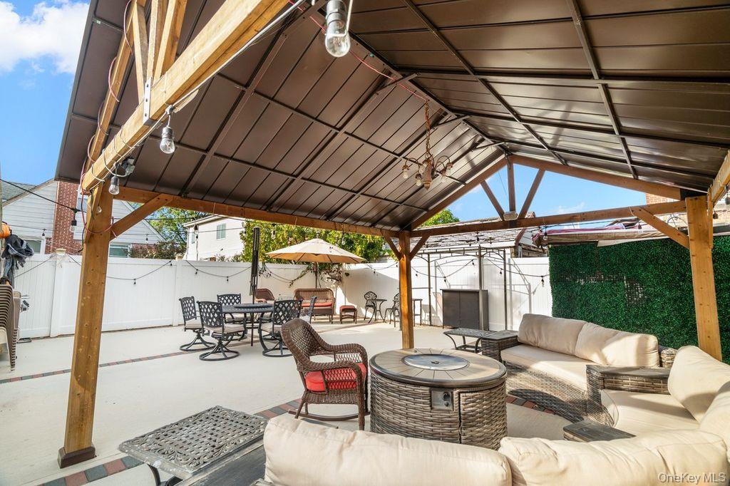 21 Jasper Street Valley Stream, NY 11580 - Photo 21 of 27 a outdoor space with patio lots of furniture