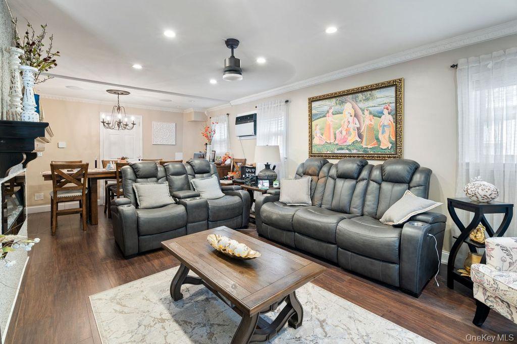 21 Jasper Street Valley Stream, NY 11580 - Photo 4 of 27 a living room with furniture wooden floor and window