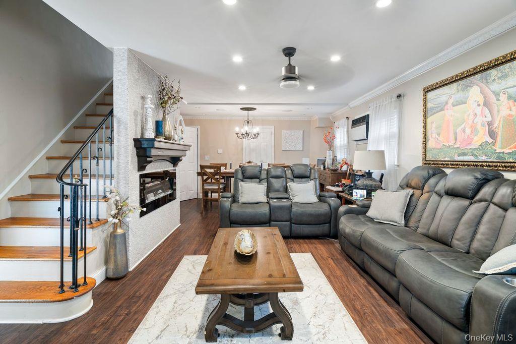 21 Jasper Street Valley Stream, NY 11580 - Photo 5 of 27 a living room with furniture and a large window