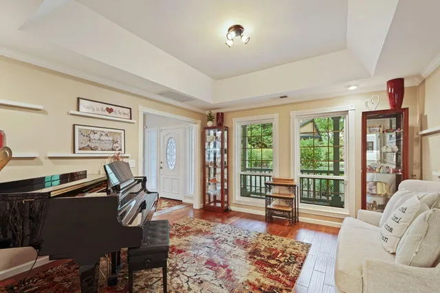 a view of a two chairs and table in the balcony