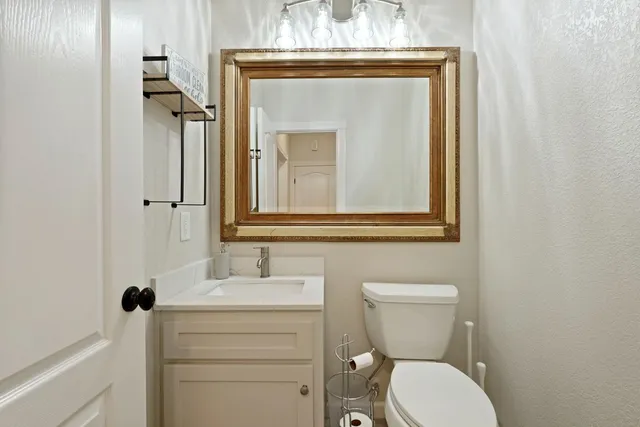 a bathroom with a shower and a mirror