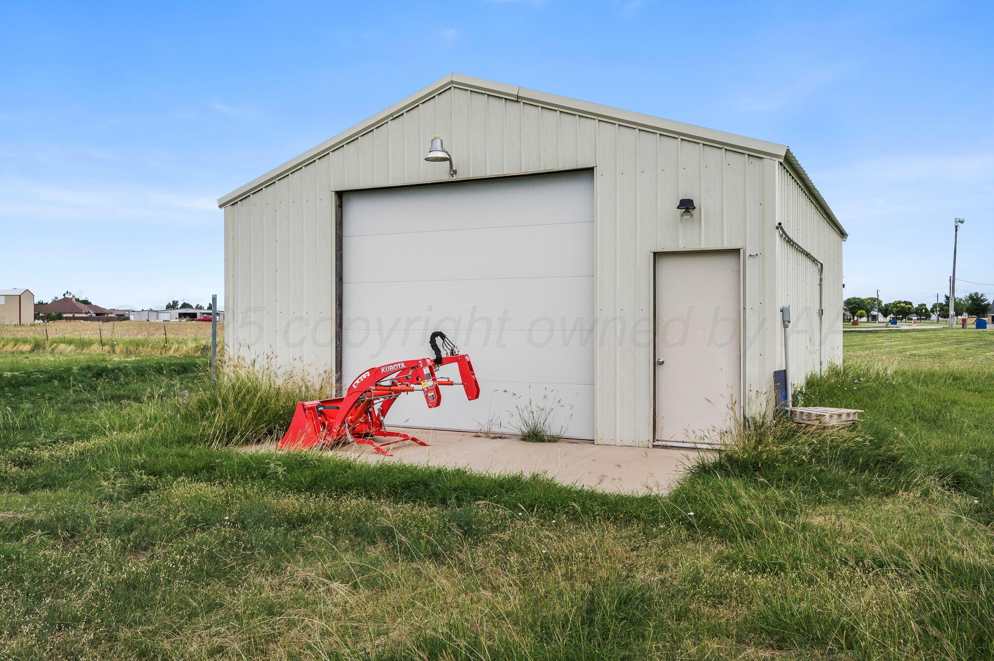 620 Lantana Road Bushland, TX 79124 - Photo 20 of 34 a view of a barn in the middle of a yard