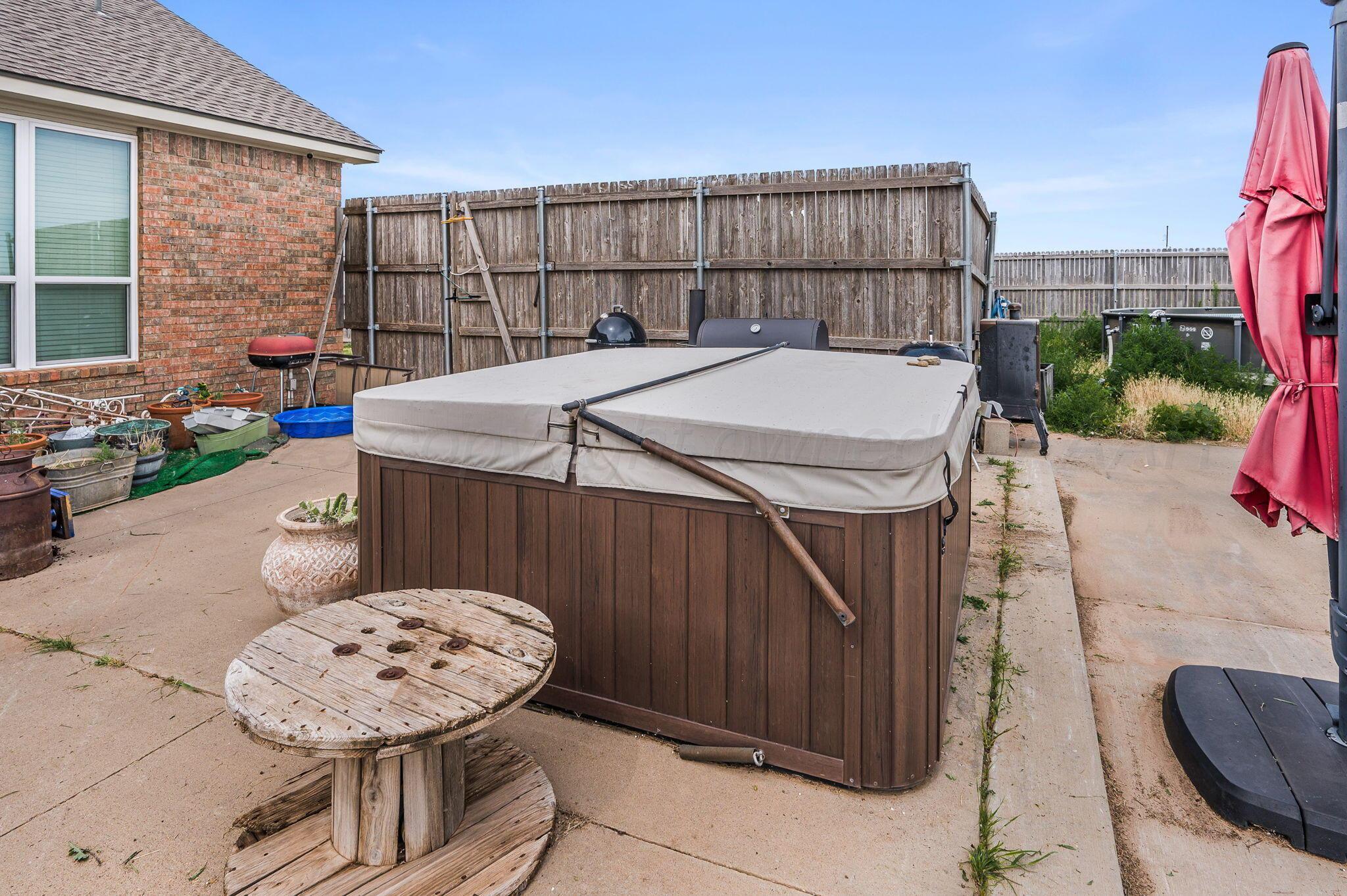 620 Lantana Road Bushland, TX 79124 - Photo 28 of 34 a view of a chairs and table in the back yard of the house