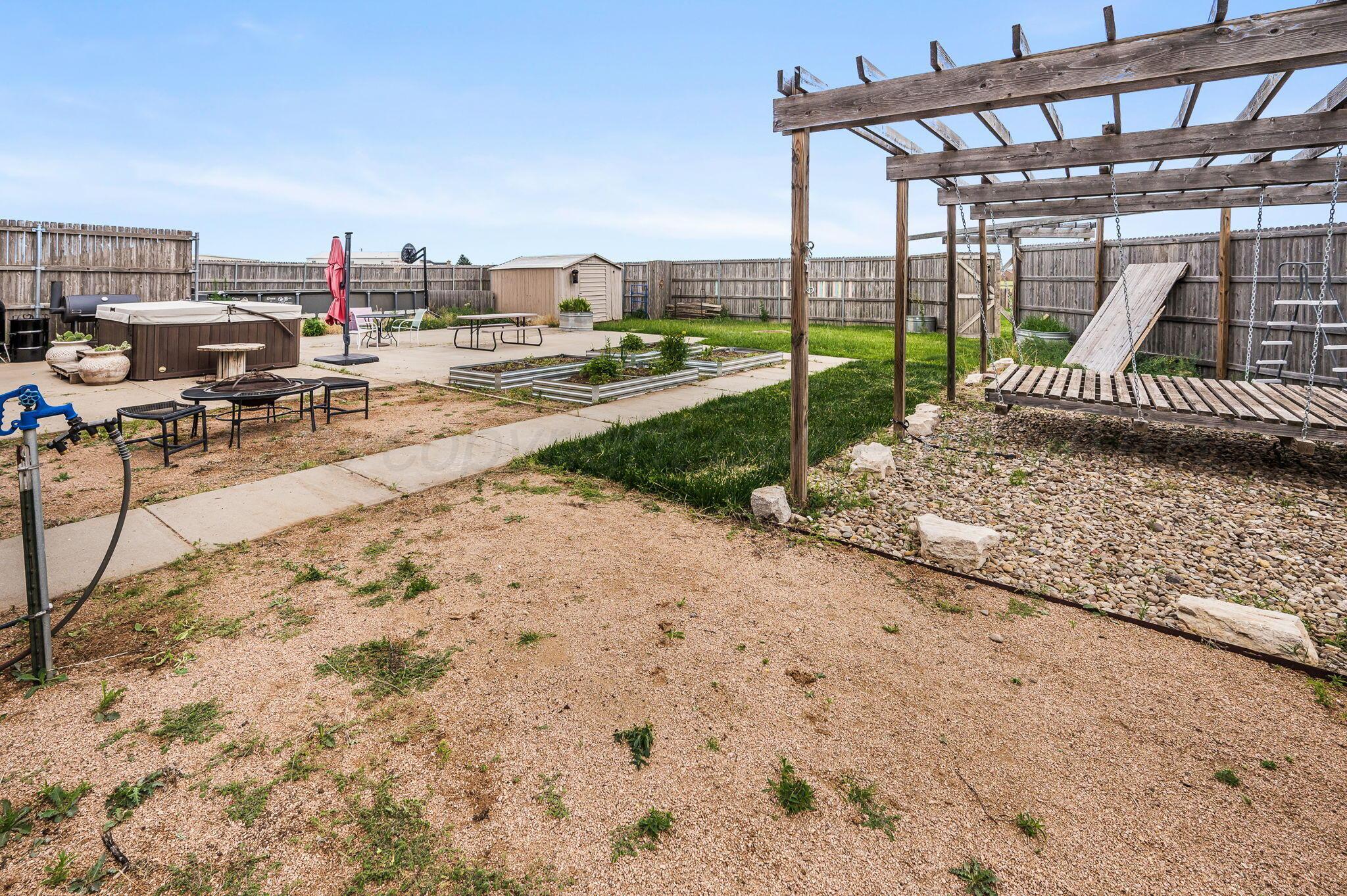 620 Lantana Road Bushland, TX 79124 - Photo 32 of 34 a view of a backyard with sitting area