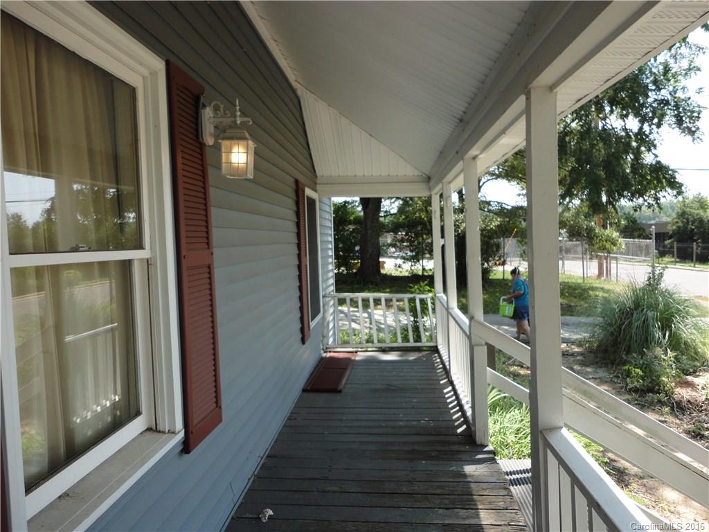 103 Williamson Street Fort Mill, SC 29715 - Photo 3 of 13 a balcony with wooden floor