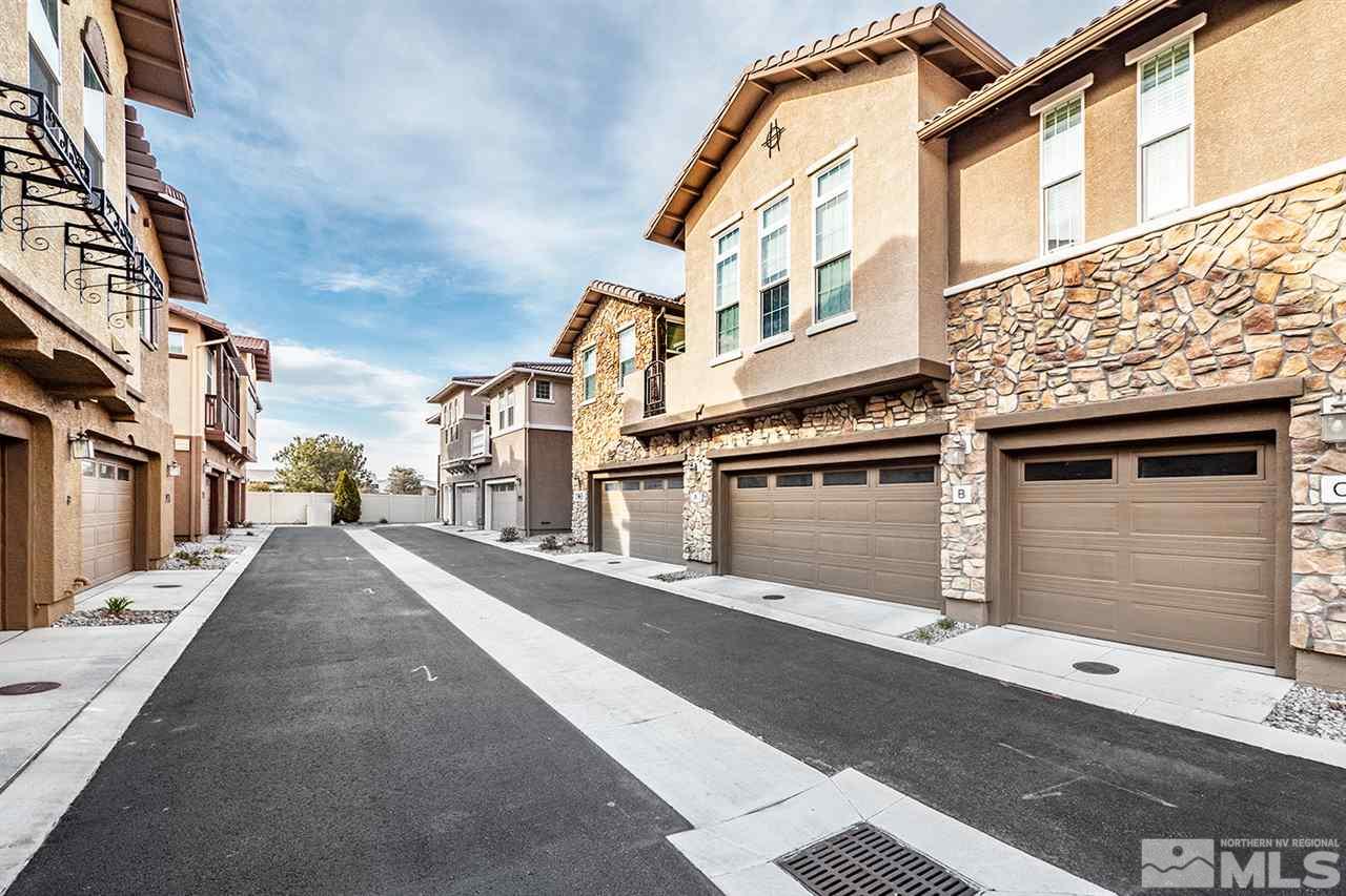 1955 Wind Ranch Road Reno, NV 89521 - Photo 1 of 18 a view of a street with buildings