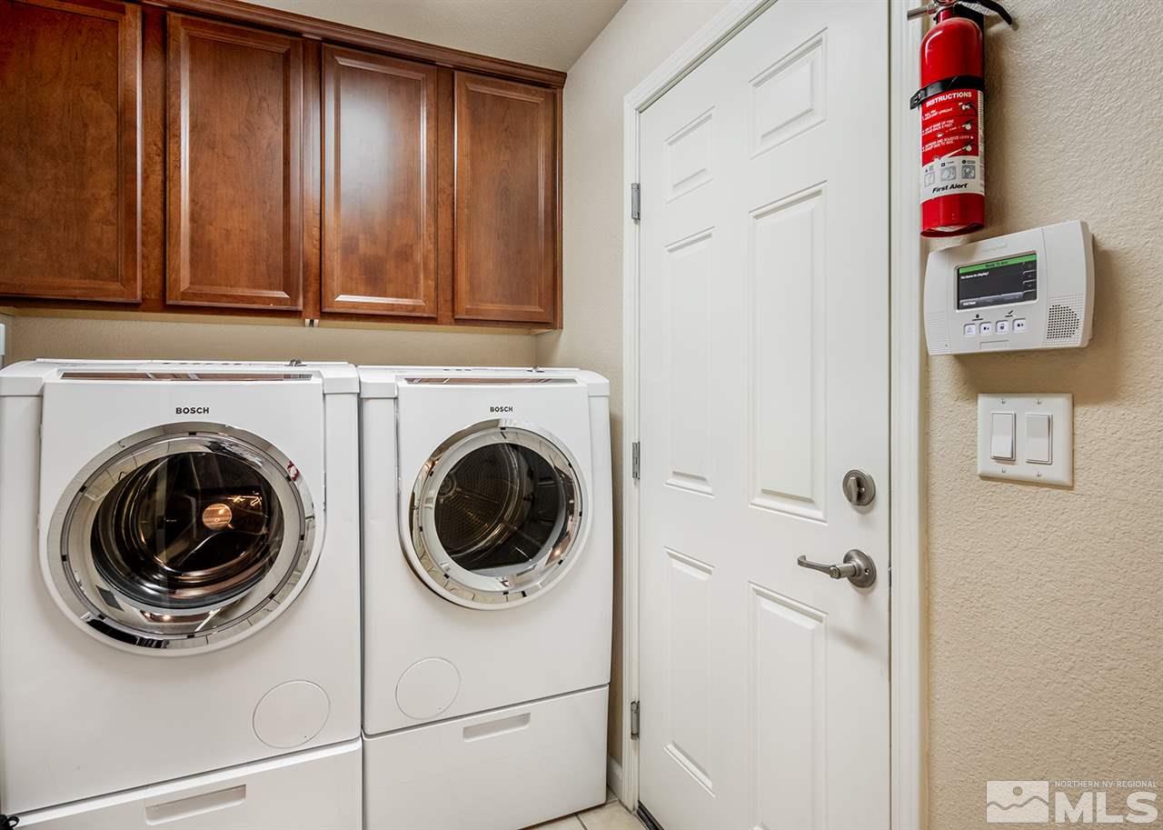 1955 Wind Ranch Road Reno, NV 89521 - Photo 12 of 18 a utility room with dryer and washer
