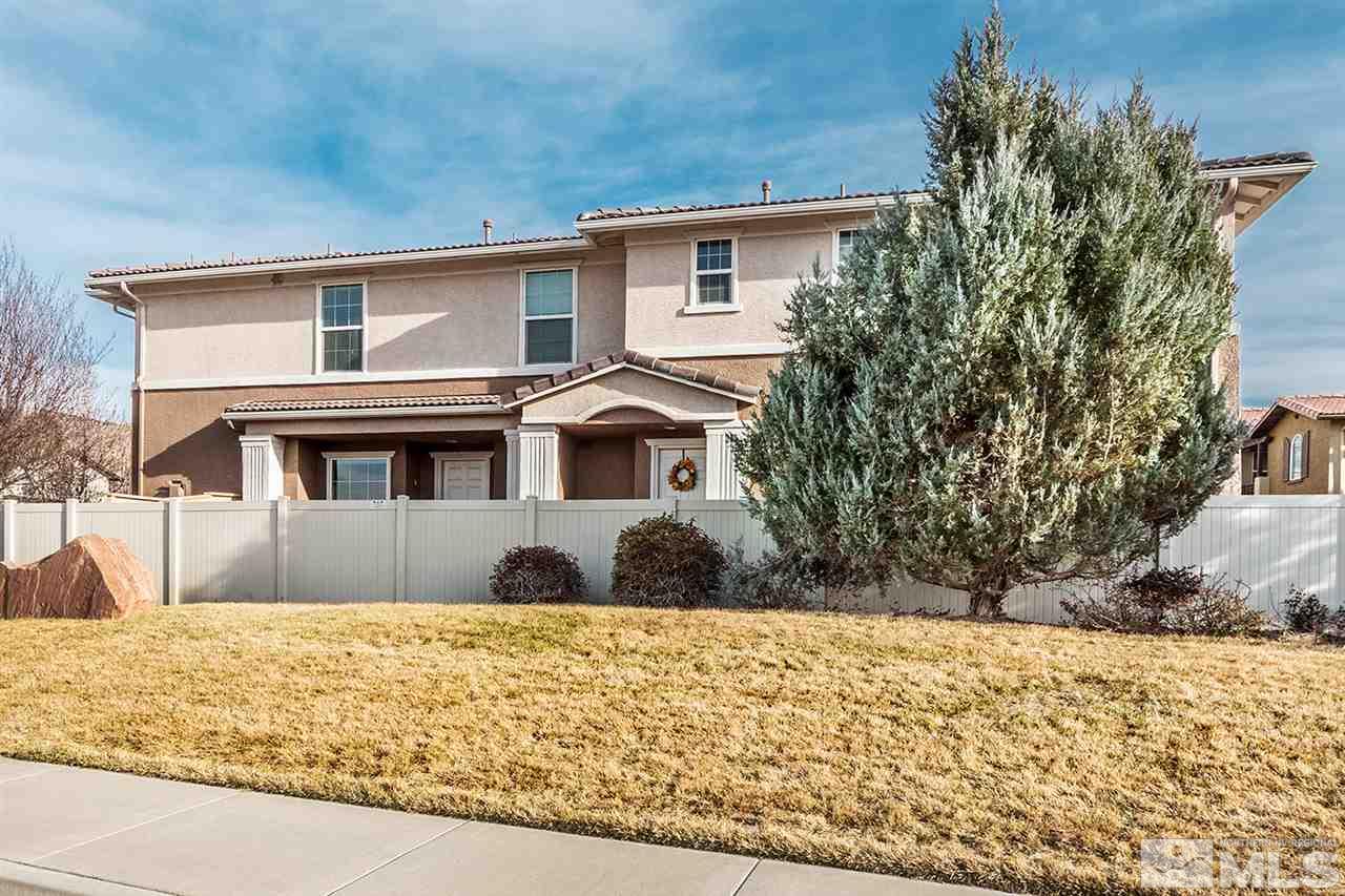 1955 Wind Ranch Road Reno, NV 89521 - Photo 2 of 18 a front view of house with a yard