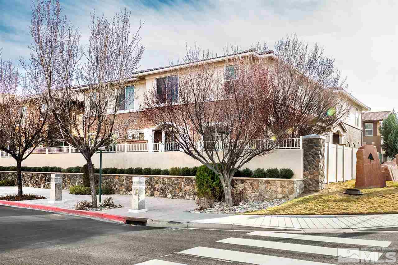 1955 Wind Ranch Road Reno, NV 89521 - Photo 3 of 18 a view of a building with a street