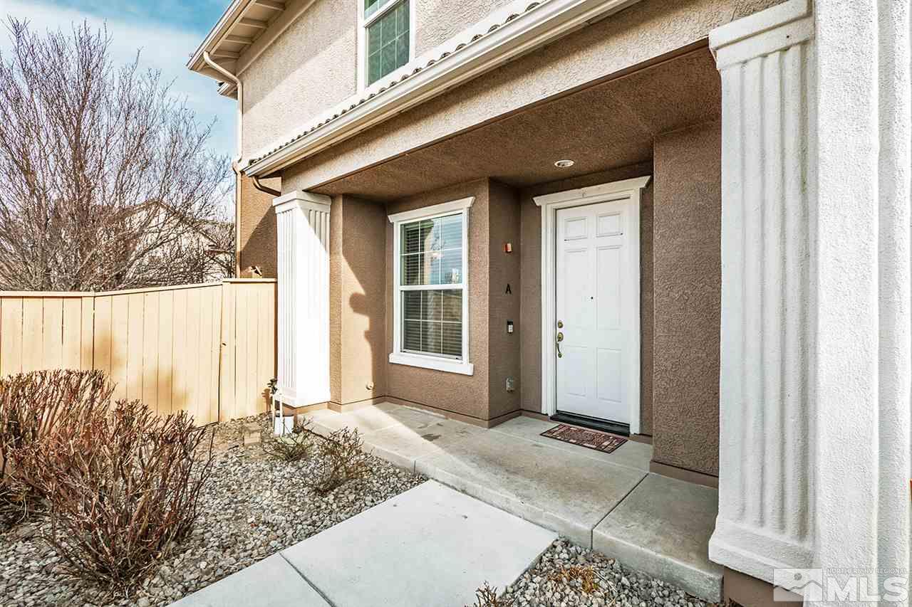 1955 Wind Ranch Road Reno, NV 89521 - Photo 4 of 18 a view of a entryway door front of house