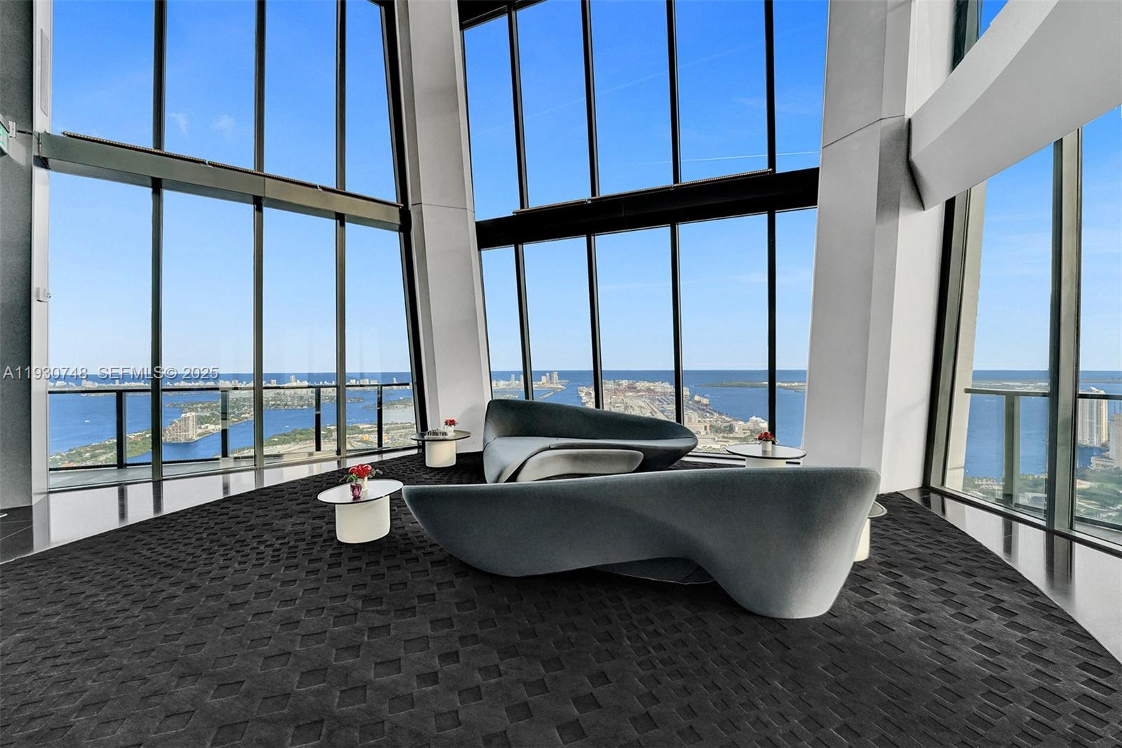 1000 Biscayne Boulevard, Unit 3902 Miami, FL 33132 - Photo 25 of 51 a living room with large windows