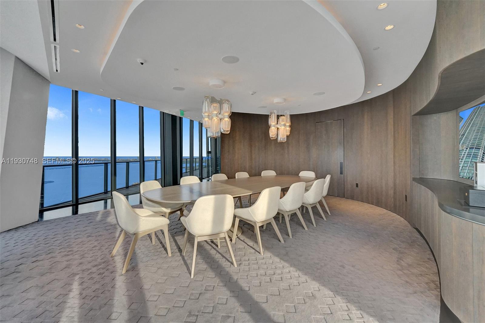 1000 Biscayne Boulevard, Unit 3902 Miami, FL 33132 - Photo 29 of 51 a view of a dining room with furniture window and wooden floor