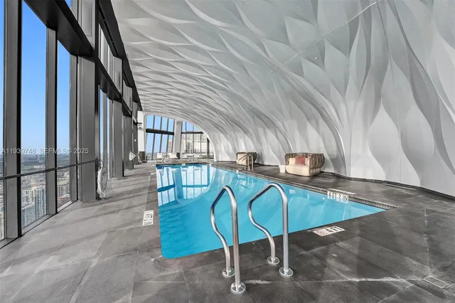 a view of staircase with a rug