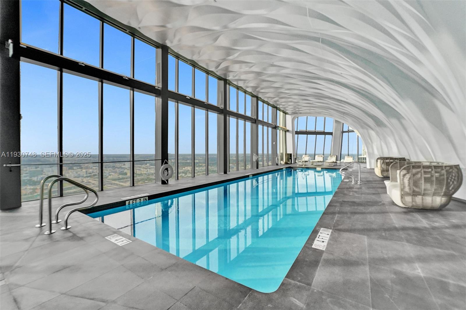 1000 Biscayne Boulevard, Unit 3902 Miami, FL 33132 - Photo 33 of 51 a view of staircase with a rug