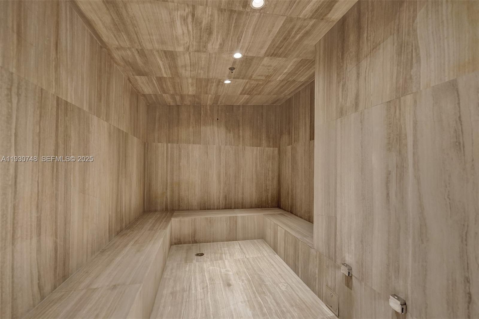 1000 Biscayne Boulevard, Unit 3902 Miami, FL 33132 - Photo 39 of 51 a view of a hallway with wooden floor