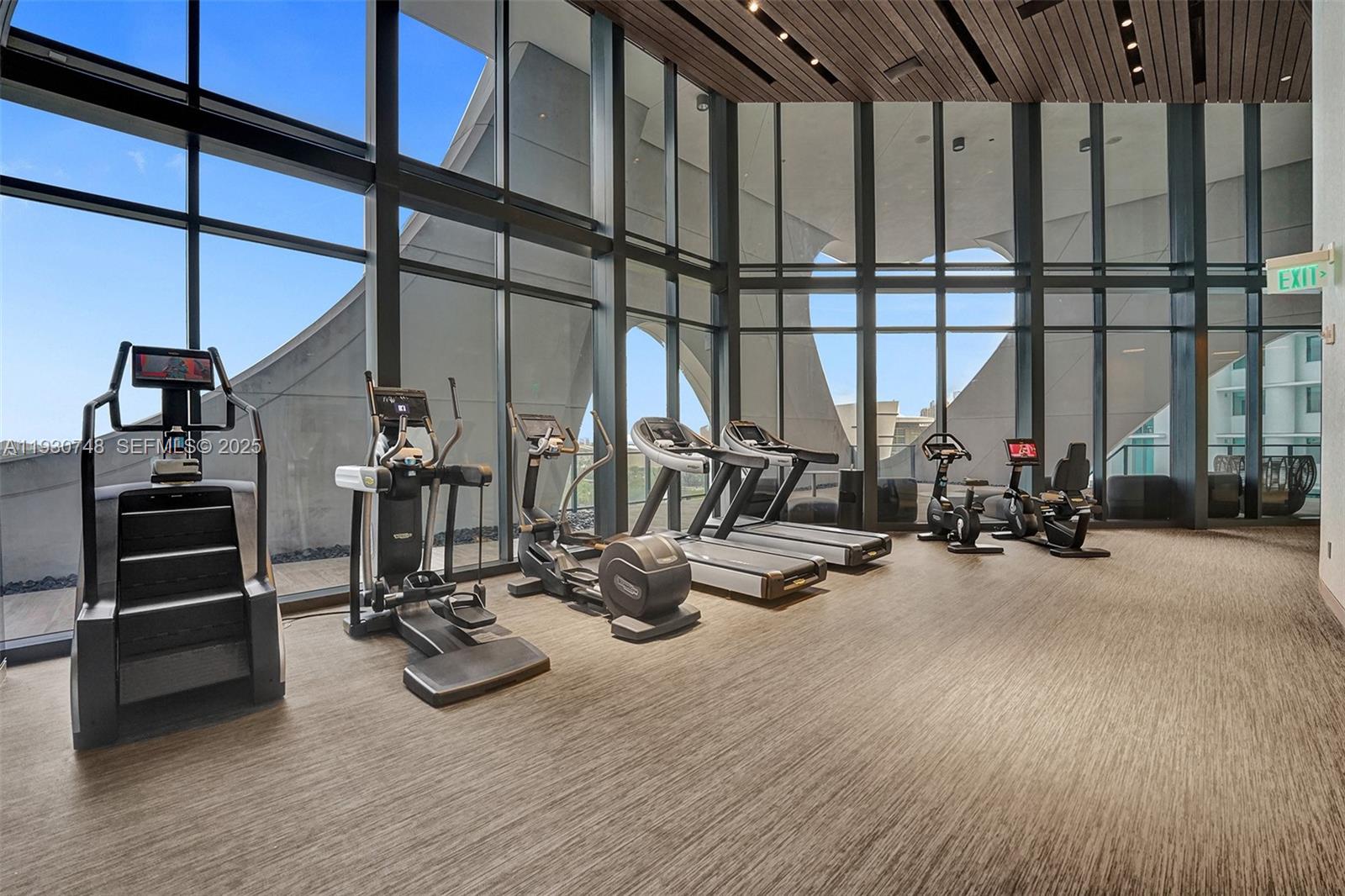 1000 Biscayne Boulevard, Unit 3902 Miami, FL 33132 - Photo 45 of 51 a view of a room with gym equipment