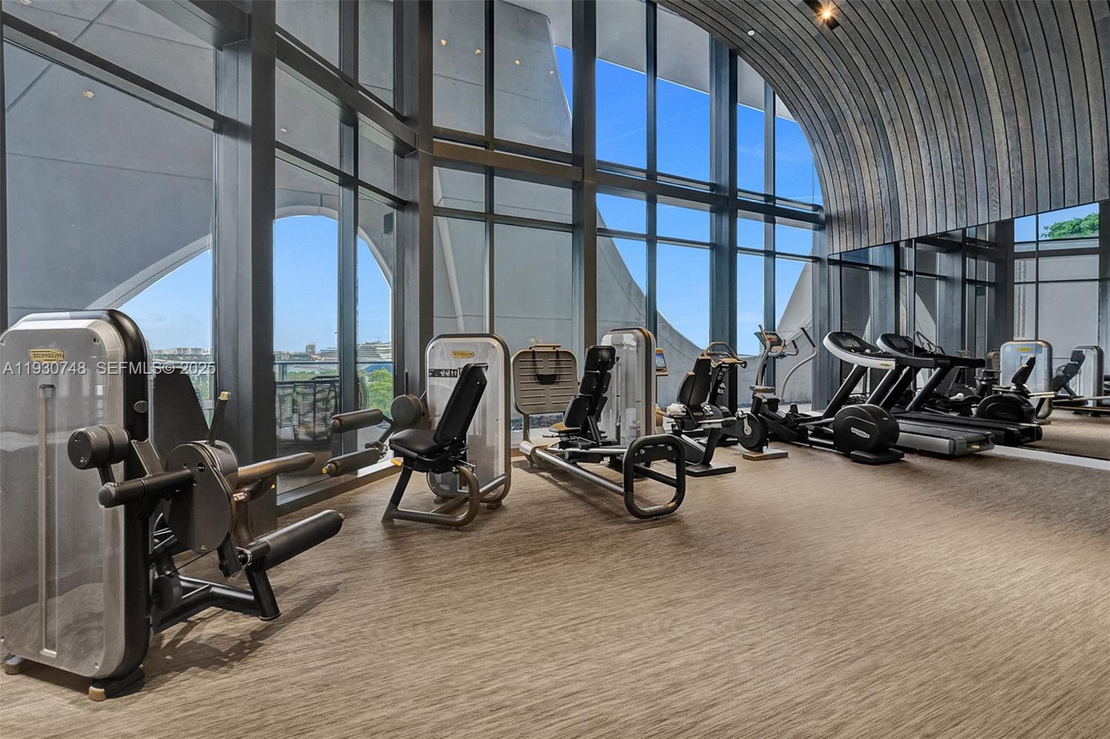 1000 Biscayne Boulevard, Unit 3902 Miami, FL 33132 - Photo 46 of 51 a view of a room with gym equipment