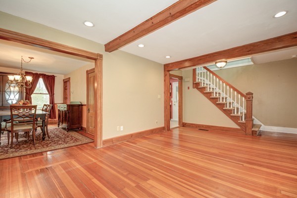 188 Shirley Road Lancaster, MA 01523 - Photo 4 of 27 a view of empty room with wooden floor and furniture