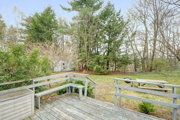 188 Shirley Road Lancaster, MA 01523 - Photo 8 of 27 a view of a balcony with wooden floor and outdoor seating