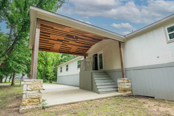 a view of a house with a bed