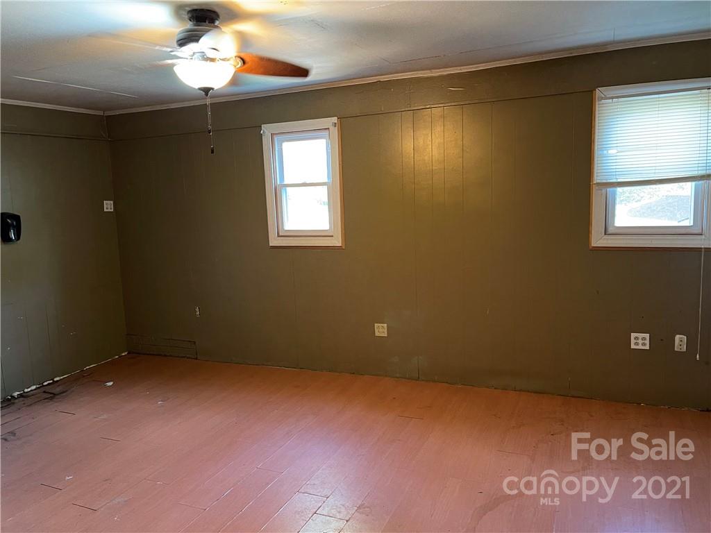 1354 Goble Road Hiddenite, NC 28636 - Photo 10 of 11 a view of an empty room with a window