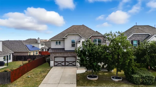 a view of a house with many windows