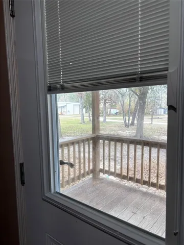 a view of a balcony and window