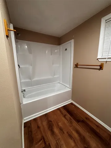 a bathroom with a bathtub