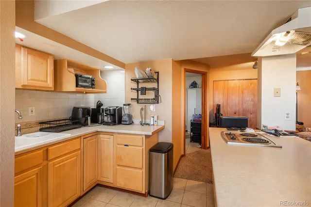 a bedroom with bed and closet