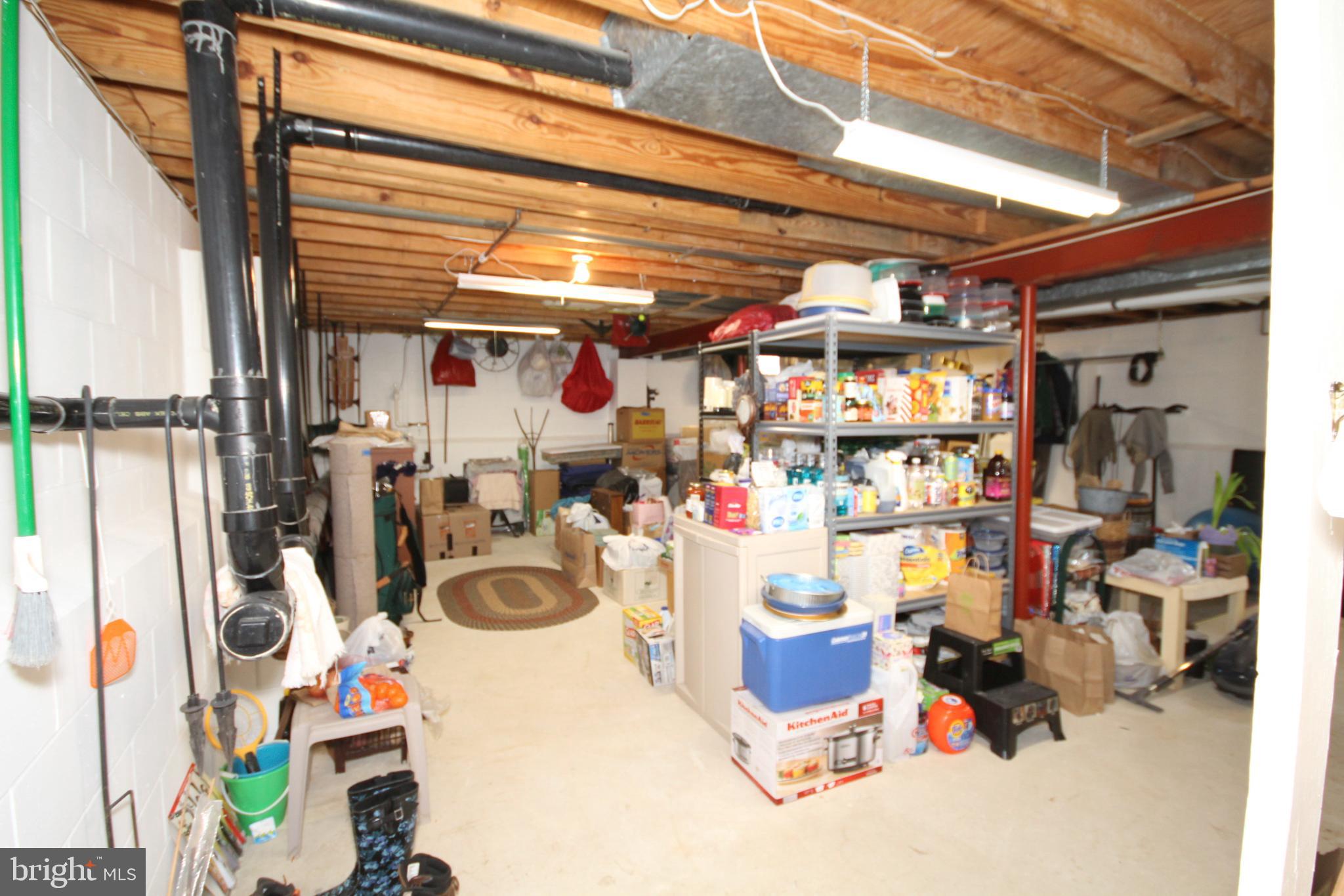448 Inverness Road Williamstown, NJ 08094 - Photo 17 of 32 a store room with lots of bottles of alcohol