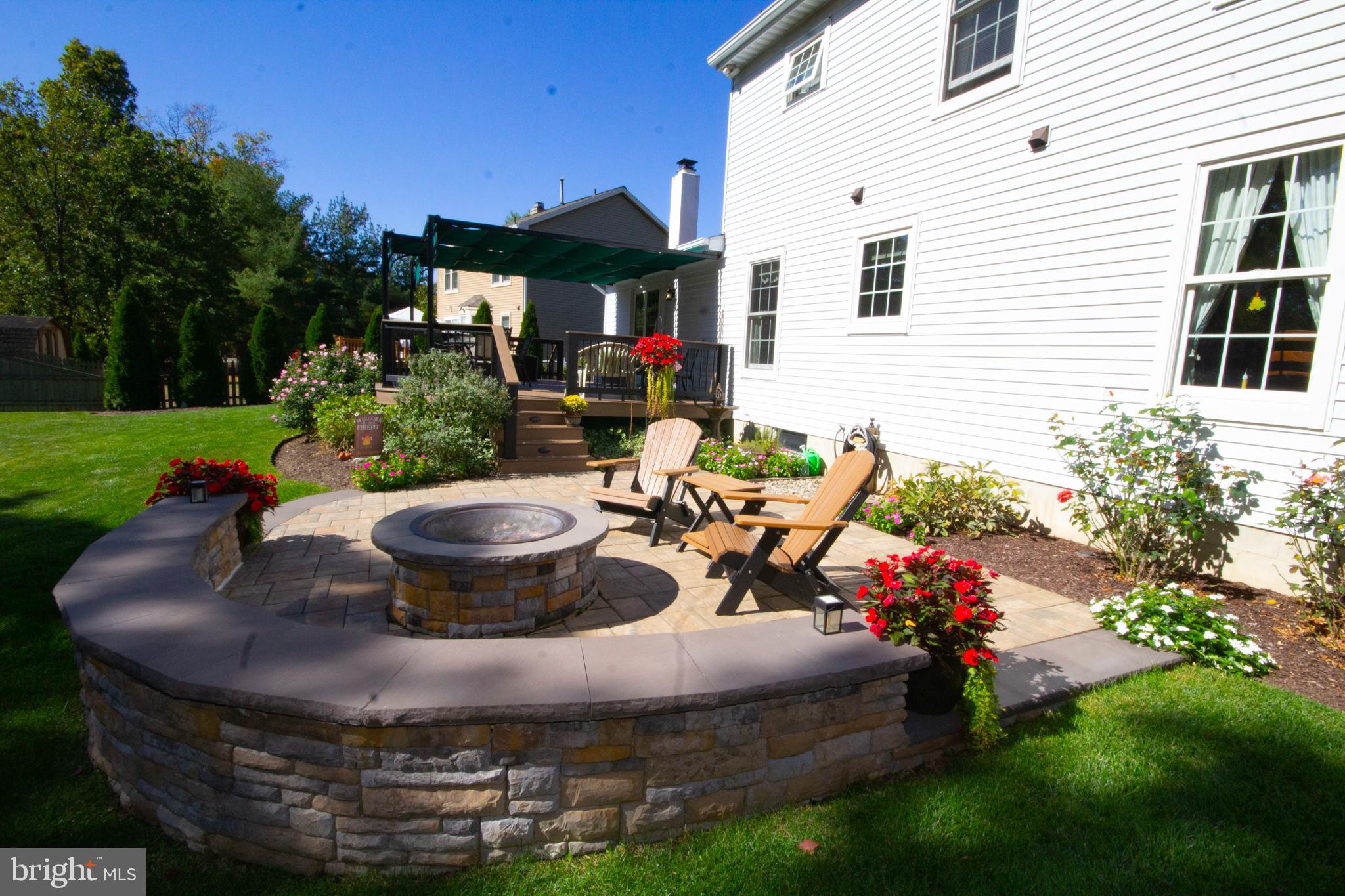448 Inverness Road Williamstown, NJ 08094 - Photo 22 of 32 a view of a backyard with sitting area and furniture