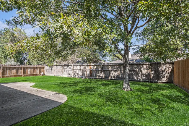 a view of a backyard with a garden
